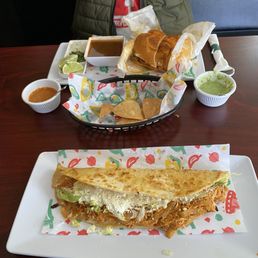 Birria Torta Con Consome Chips and salsa Tinga de Pollo quesadilla Birria Torta Con Consome Chips and salsa Tinga de Pollo quesadilla