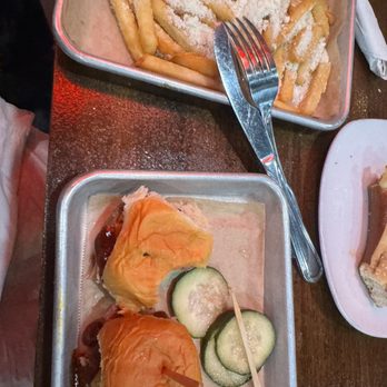 Bubba’s Bones & Brews - French Fries and brisket sliders great tenderness to brisket and fries could use garlic or something to connect the cheese - Gastropubs Near Me - Cathedral City, California