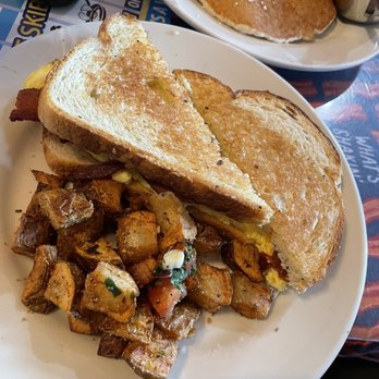 Sky Blue Cafe - Breakfast sandwich with potatoes. Delicious! - Coffee & Tea Near Me - Nashville, Tennessee Sky Blue Cafe - Breakfast sandwich with potatoes. Delicious! - Coffee & Tea Near Me - Nashville, Tennessee