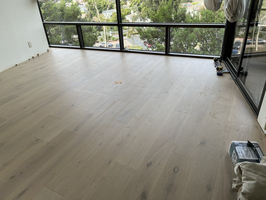 Engineered Wood Installation - Take a look at the incredible transformation of this condo with our premium engineered wood flooring!

Before: The space featured dated, worn-out flooring that didn’t complement the modern aesthetic of the condo. It lacked warmth and sophistication, making the area feel less inviting.

After: Our expert installation of high-end engineered wood flooring completely revitalized the space. The rich tones and sleek finish brought a sense of luxury and warmth, instantly elevating the entire atmosphere of the condo. The new flooring enhances the beauty of the home, creating a timeless, upscale look that will last for years.

Ready for your own transformation?
Call today for a free estimate or visit our luxury flooring showroom in Beverly Hills. Explore our exquisite selection of flooring options tailored for upscale homes and buildings. Our professional team ensures flawless installation that makes your luxury flooring look stunning and durable.

Call now at +1 (213) 657-8731 or click to dial for more information.