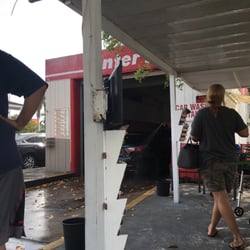 Car enters in and gets washed in there.