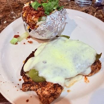 Cattle Baron - Grilled chicken with green chili and baked potato - Steakhouses Near Me - Ruidoso, New Mexico Cattle Baron - Grilled chicken with green chili and baked potato - Steakhouses Near Me - Ruidoso, New Mexico