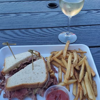 The Boot Room - Gluten-free Rueben sandwich with fries and the vegan salad with chicken added (don't judge). - Bars Near Me - Durham, North Carolina The Boot Room - Gluten-free Rueben sandwich with fries and the vegan salad with chicken added (don't judge). - Bars Near Me - Durham, North Carolina