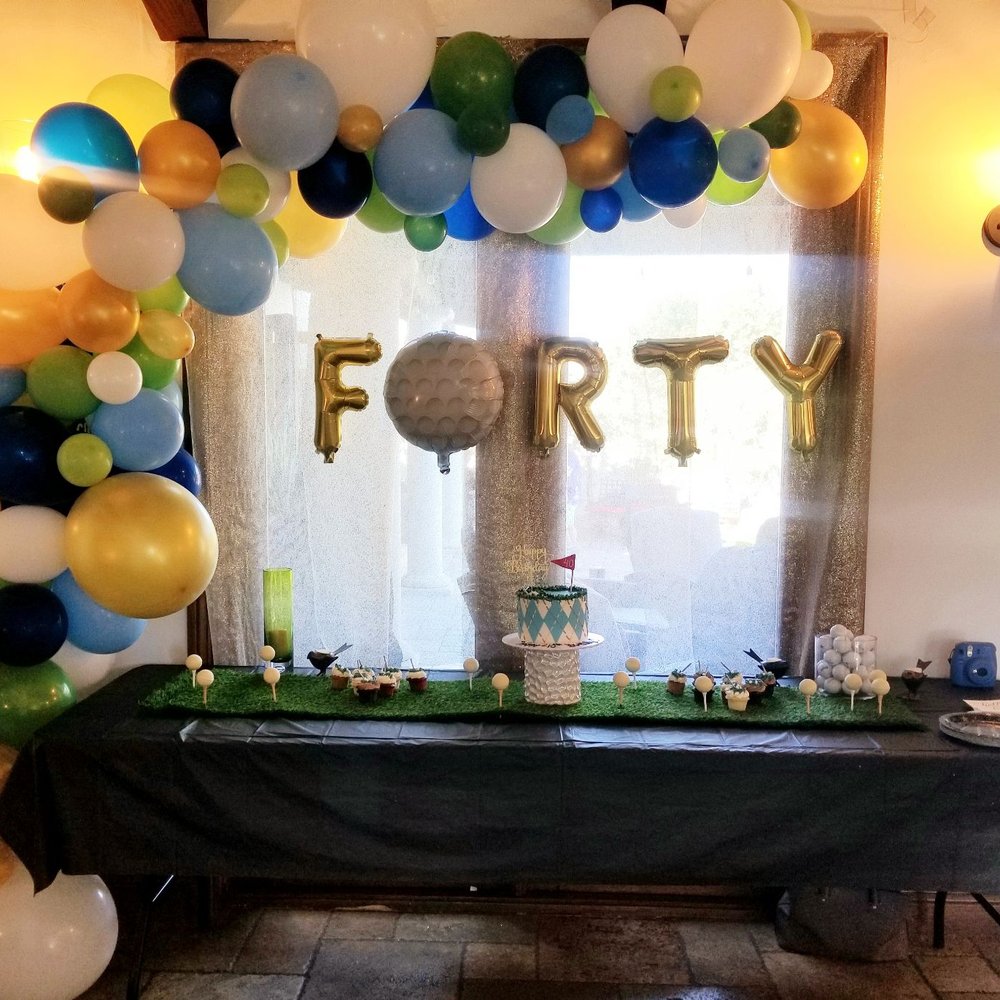 Balloon waterfall, balloon letters, and golf ball were a hit!