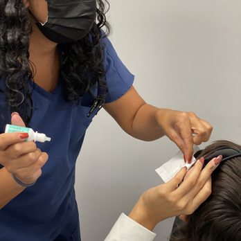 Lasik Md - Yessi helping with extra eye lubricant post-op. - Laser Eye Surgery/Lasik Near Me - Miami, Florida Lasik Md - Yessi helping with extra eye lubricant post-op. - Laser Eye Surgery/Lasik Near Me - Miami, Florida