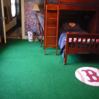 American Rug - Do something fun!  Turf like carpet installed to simulate the Red Sox playing field with an added bonus of a hole for golfing - Carpeting Near Me - Holyoke, Massachusetts