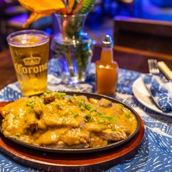 Moani Waikiki - Boneless Pork Chop w/ Truffle Mushroom Gravy