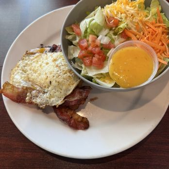 Murph's Patio Bar & Grill - Hamburger with bacon cheese, and egg on top next to the side salad. - Chicken Wings Near Me - DeLand, Florida Murph's Patio Bar & Grill - Hamburger with bacon cheese, and egg on top next to the side salad. - Chicken Wings Near Me - DeLand, Florida
