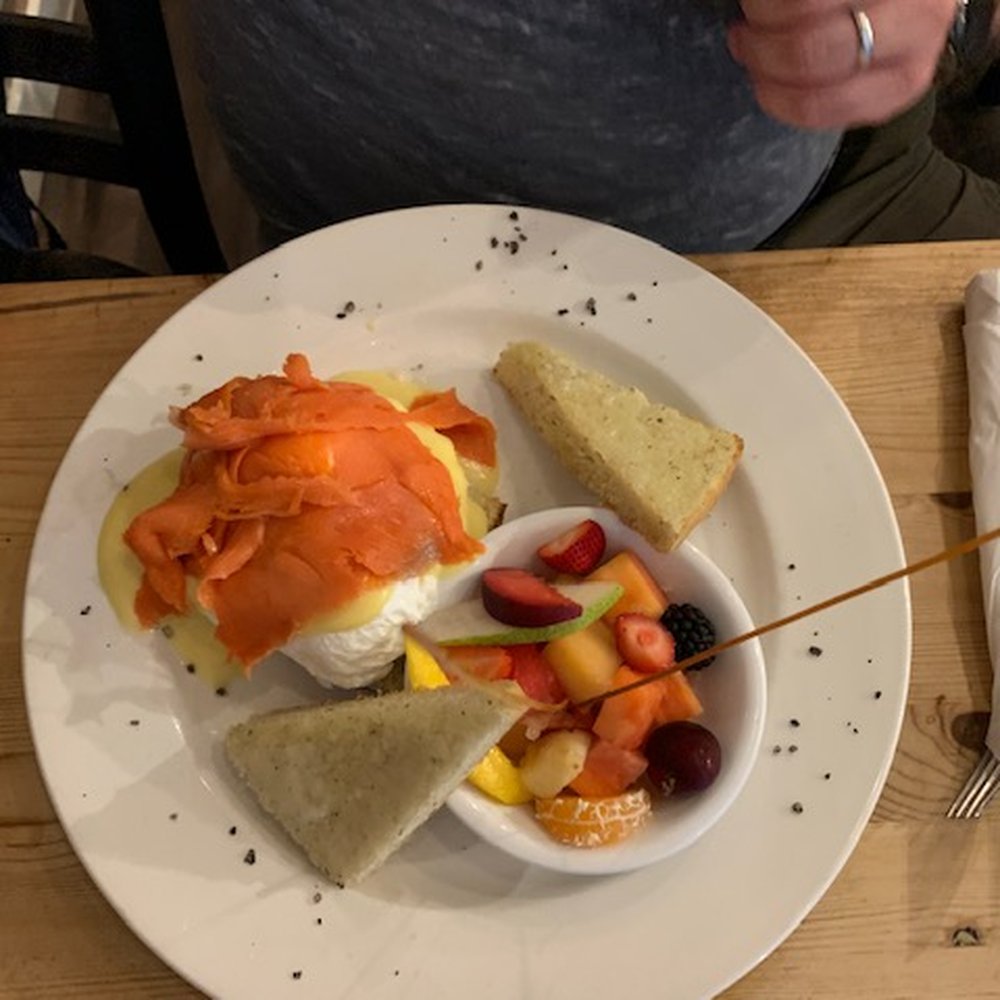 Brioche Ristorante - The Eggs Benedict with brioche toast and a ramekin of fruit - Italian Near Me - Vancouver, British Columbia Brioche Ristorante - The Eggs Benedict with brioche toast and a ramekin of fruit - Italian Near Me - Vancouver, British Columbia