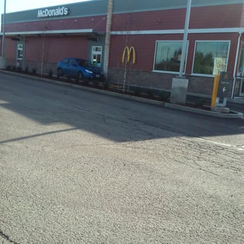 McDonald's - a blue car parked in front of a mcdonald's - Fast Food Near Me - Rochester, Washington