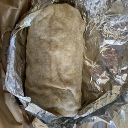 Carne asada burrito w dragons breath salsa. Muy caliente Carne asada burrito w dragons breath salsa. Muy caliente