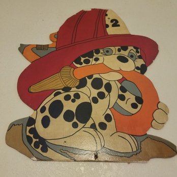 Backdraft Bar-Be-Que - A cute Dalmatian wearing a firefighter hat and a fire hose in his mouth - Barbeque Near Me - Highlands, Texas