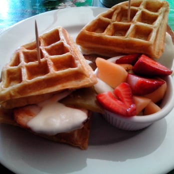 Monkey Business Cafe - Blackened Ortega Chicken sandwich on waffle with fruit. - Sandwiches Near Me - Fullerton, California Monkey Business Cafe - Blackened Ortega Chicken sandwich on waffle with fruit. - Sandwiches Near Me - Fullerton, California