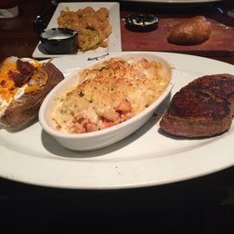 Sirloin and lobster Mac and cheese with shrimp app in the background Sirloin and lobster Mac and cheese with shrimp app in the background