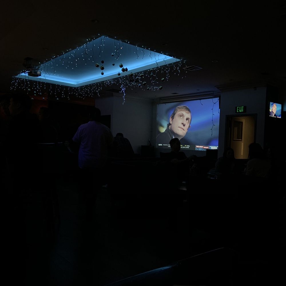 Cafe Bleu - Sports ball playing on the big tv, other TVs across the bar showing the same game - Sports Bars Near Me - Los Angeles, California