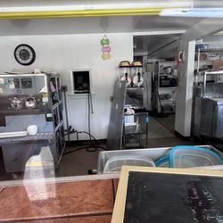 Custer's Last Stand - Soft serve machines being disassembled.