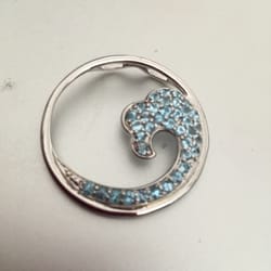 Royal Gold - Beautiful blue topaz and sterling wave pendant!