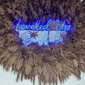Leveled Up Buffalo - The sign in their front window. - Women's Clothing Near Me - East Aurora, New York