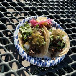Steak tacos with cilantro, onion and mild salsa Steak tacos with cilantro, onion and mild salsa