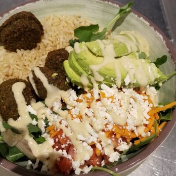 Rice Mediterranean Kitchen - Bowl with falafel and avocado over brown rice - Mediterranean Near Me - Coral Gables, Florida Rice Mediterranean Kitchen - Bowl with falafel and avocado over brown rice - Mediterranean Near Me - Coral Gables, Florida