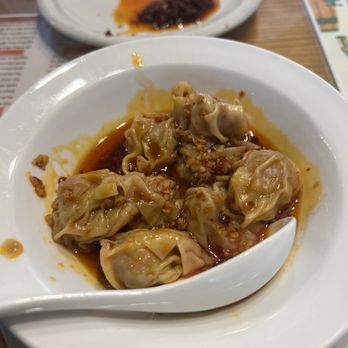 Dim Sum House - Partly eaten chili oil won ton - Dim Sum Near Me - Seattle, Washington Dim Sum House - Partly eaten chili oil won ton - Dim Sum Near Me - Seattle, Washington