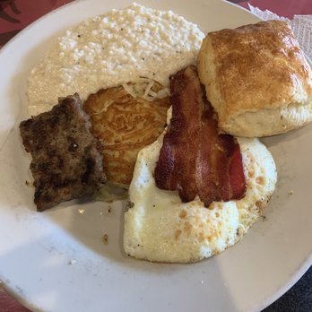 Sunrise Memphis - The kitchen sink: grits, sausage, bacon, hash browns, eggs, and a biscuit! - Breakfast & Brunch Near Me - Memphis, Tennessee Sunrise Memphis - The kitchen sink: grits, sausage, bacon, hash browns, eggs, and a biscuit! - Breakfast & Brunch Near Me - Memphis, Tennessee