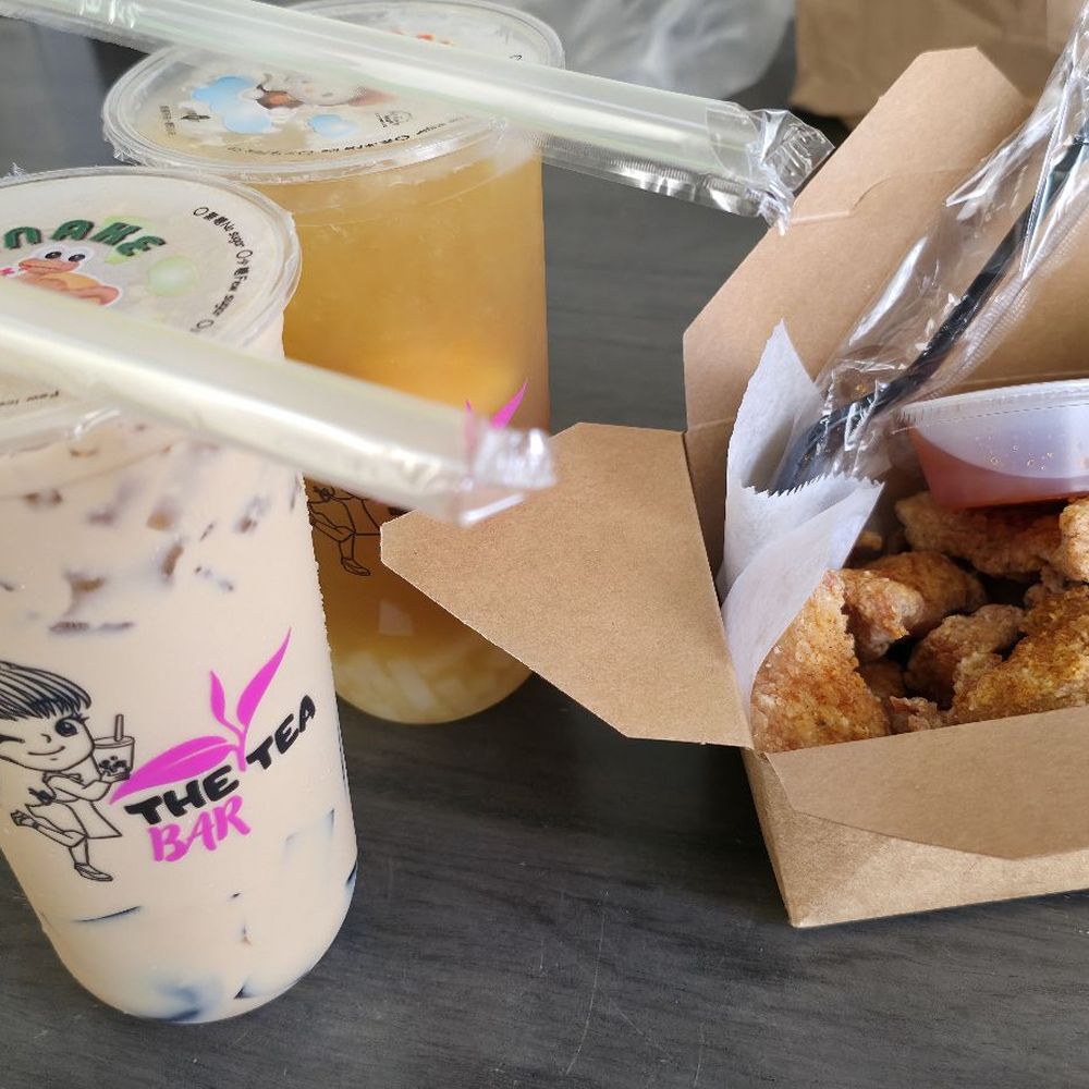 The Tea Bar - Popcorn chicken Milk tea half sweet with grass jelly Lychee green tea half sweet w/ lychee jelly - Bubble Tea Near Me - Houston, Texas The Tea Bar - Popcorn chicken Milk tea half sweet with grass jelly Lychee green tea half sweet w/ lychee jelly - Bubble Tea Near Me - Houston, Texas
