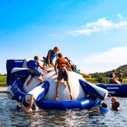 YMCA Camp Lakewood - Making a splash! Whether it's the blob, the slide, or just a cannonball, the waterfront is the place to be.