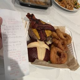 Definitely NOT a short rib burger. It's a COLD bacon burger. Definitely NOT a short rib burger. It's a COLD bacon burger.