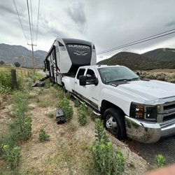 Road Runner Towing & Storage - Tow a dually and trailer.