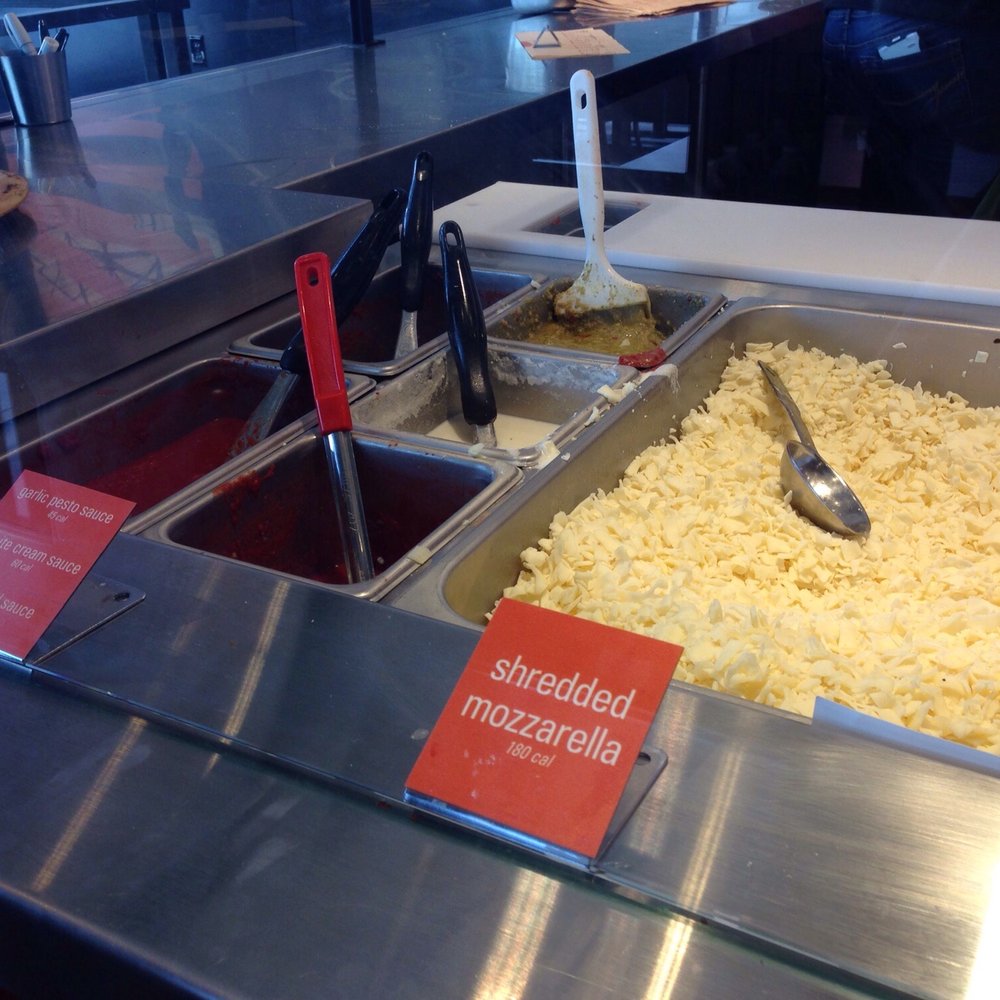 Shredded mozzarella and sauce options.