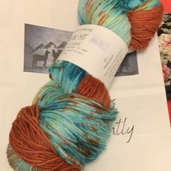 Alpaca Tracks Thread Lightly - This is the sock yarn I did manage to pick up. Apparently the terra cotta bit is for the toes and heel. Definitely not their product!!