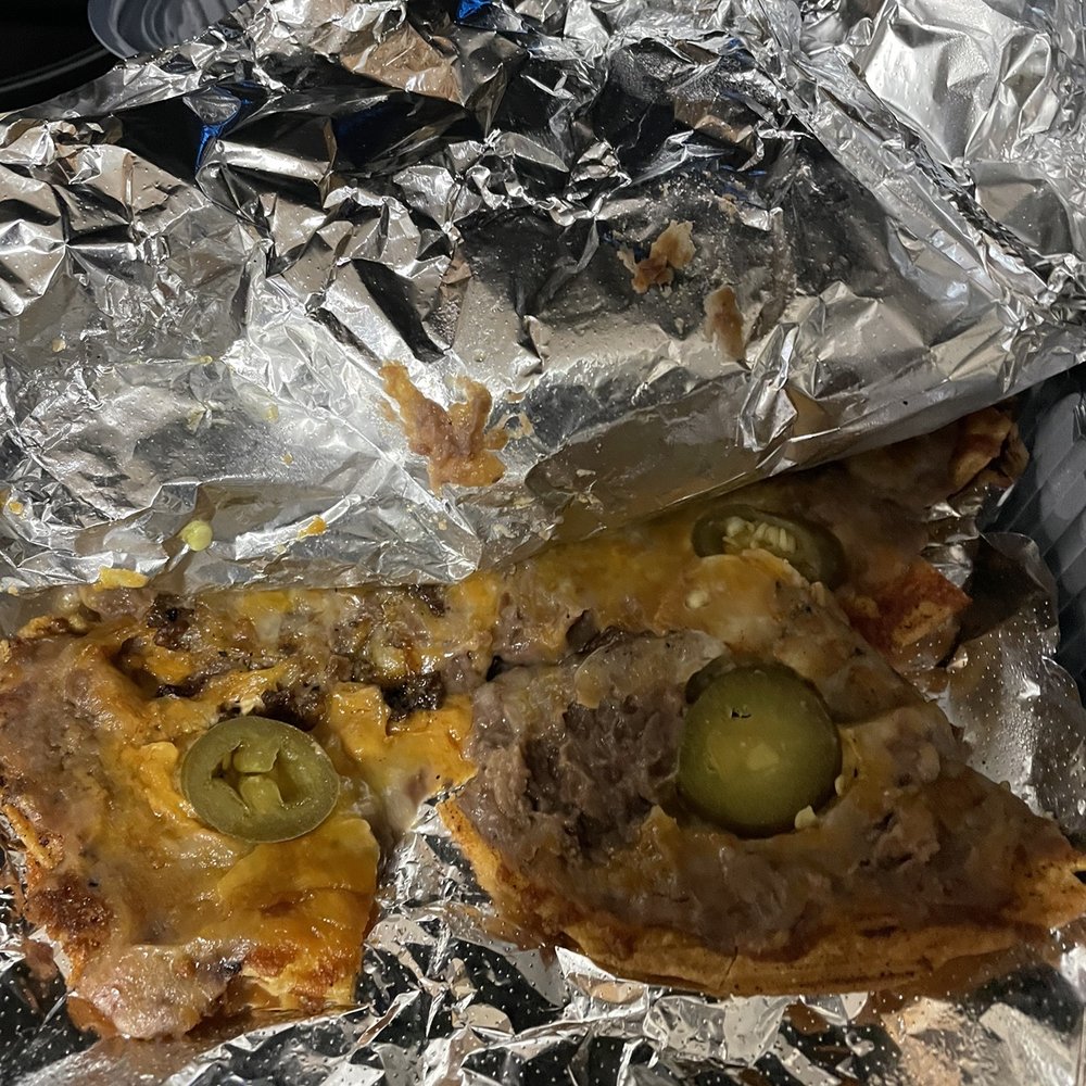Chili's - I ordered nachos, but I'm not sure what this is. - American Near Me - Orange City, Florida