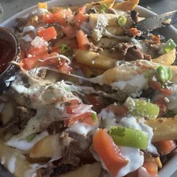 Happy hour carne asada fries Happy hour carne asada fries
