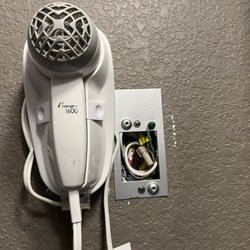 Econo Lodge - Exposed wiring in the room.