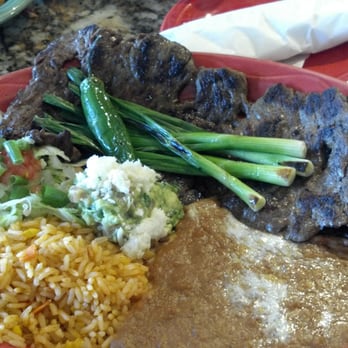 El Merendero - Carne asada combo plate. HUGE skirt steak with rice, beans, onions, a jalepeno, and guacamole served with a flour tortilla - Mexican Near Me - Tucson, Arizona El Merendero - Carne asada combo plate. HUGE skirt steak with rice, beans, onions, a jalepeno, and guacamole served with a flour tortilla - Mexican Near Me - Tucson, Arizona