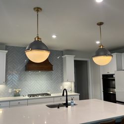 Portico Interior Design - Island chandeliers and hood