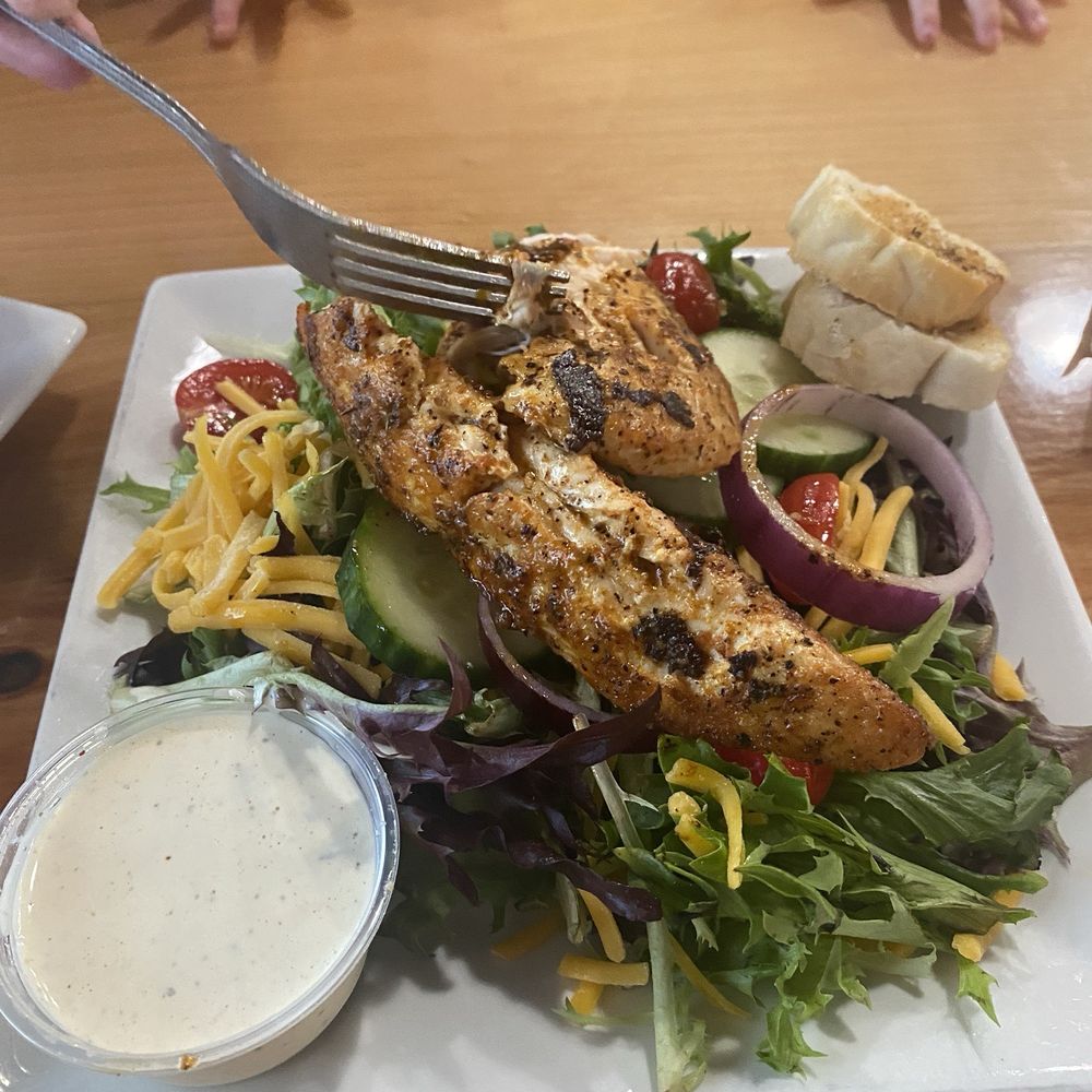 Prejean's - Cup of select gumbo with side salad topped with chicken - Cajun/Creole Near Me - Broussard, Louisiana Prejean's - Cup of select gumbo with side salad topped with chicken - Cajun/Creole Near Me - Broussard, Louisiana