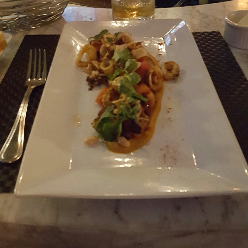 Bistro 45 - Calamari over egg plant puree... Excellent! - New American Near Me - Pasadena, California Bistro 45 - Calamari over egg plant puree... Excellent! - New American Near Me - Pasadena, California