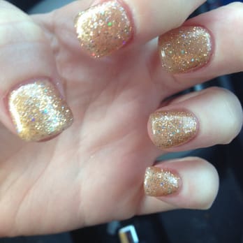Apple Nails - Kim painted my nails with two different gold gels, first two shades of a metallic gold gel and row shades of a sparkly gel. - Nail Salons Near Me - Cypress, California