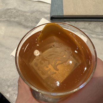 The Conservatory - Ritz branded ice cube in old fashioned - New American Near Me - Half Moon Bay, California The Conservatory - Ritz branded ice cube in old fashioned - New American Near Me - Half Moon Bay, California
