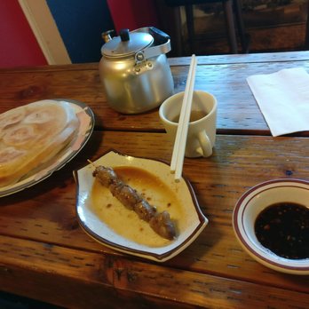 Ping's Dumpling House - Food! The buns are upside-down, fresh batch. - Dim Sum Near Me - Seattle, Washington