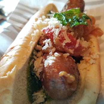 The Vanguard - Bellomo with pork sausage, fennel, sarvecchio, topped with sautéed peppers, caramelized onions and pesto - Bars Near Me - Milwaukee, Wisconsin The Vanguard - Bellomo with pork sausage, fennel, sarvecchio, topped with sautéed peppers, caramelized onions and pesto - Bars Near Me - Milwaukee, Wisconsin