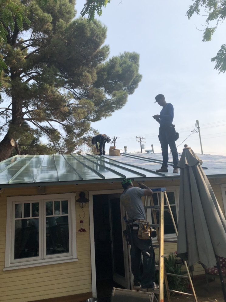 Slide of Reno's Roofing