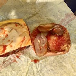 McDonald's - A disgusting miserable excuse of a cheeseburger! Drowning, and ketchup!