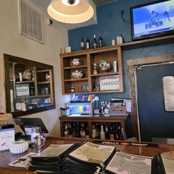 The area next to the bar where the menus were kept and Take Out orders were placed.