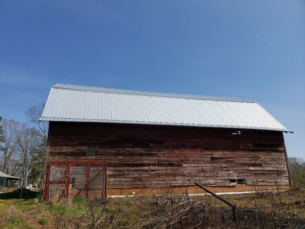 Slide of Ram's Roofing Service