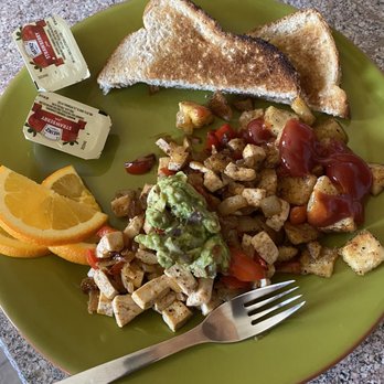 The Passenger - This is what I got. On a normal 10" plate.  No black beans, and the three orange slices are the fresh fruit, I guess. - New American Near Me - Longmont, Colorado