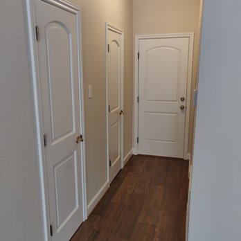 Memorial West Contractors - a hallway with white doors and hardwood floors - General Contractors Near Me - Houston, Texas Memorial West Contractors - a hallway with white doors and hardwood floors - General Contractors Near Me - Houston, Texas