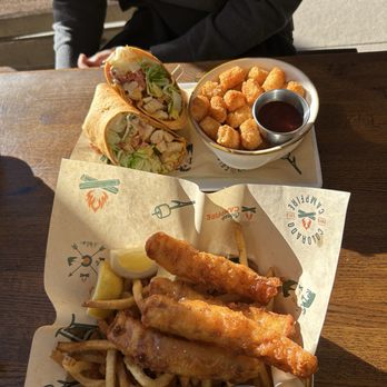 Colorado Campfire - Grilled buffalo chicken wrap with side of tater tots. Fish (cod) and chips with tartar sauce. - American Near Me - Denver, Colorado